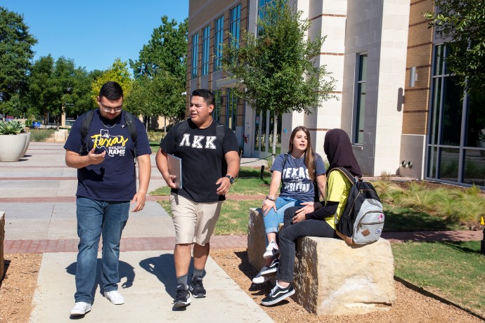 Photo of students walking outside Martin Center.