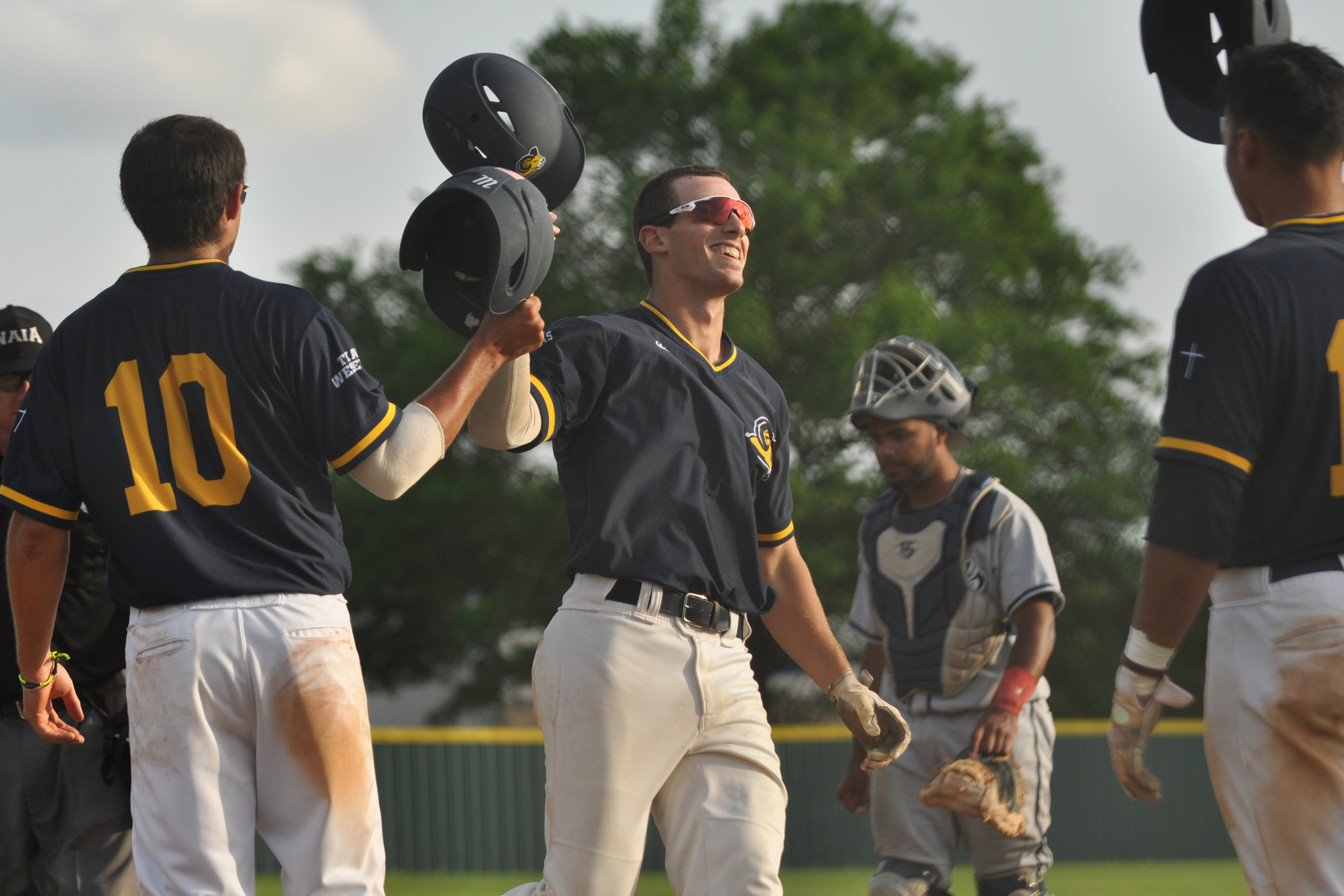 Kiki Menendez celebrates a home run against St. Gregory's.