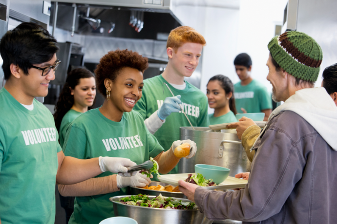 Volunteers serving food