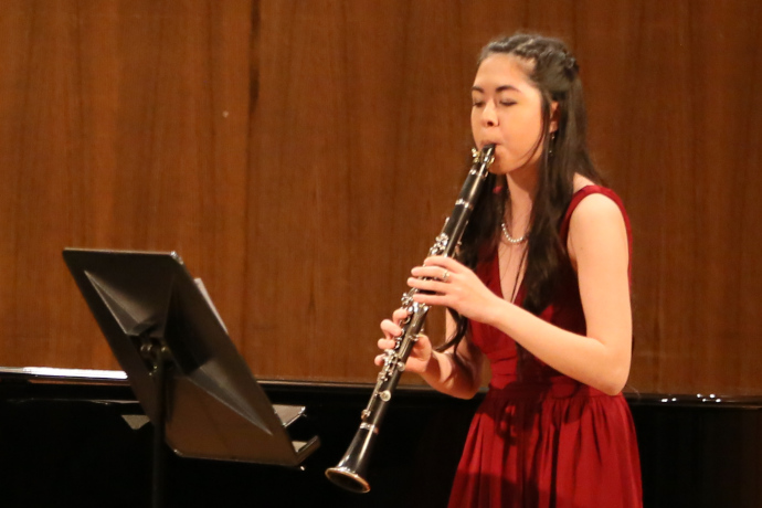 Junior music student Jasmin White playing clarinet at the