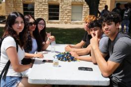 students sitting at table