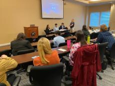 Students presenting research in classroom