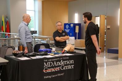Student visiting a vendor table