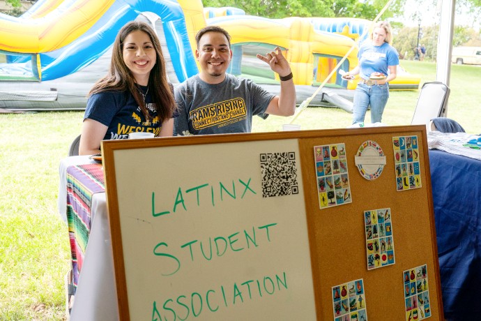 Students from the Latinx Student Organization promoting their org