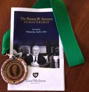 Medal & 2014 Program wood background