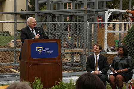 Bishop Mike Lowry address the crowd during the April 2015 Texas Wesleyan University clock tower topping out ceremony.