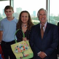 In a publicity event at The Stayton at Museum Way on Sept. 19, 2014, Texas Wesleyan alumna Kary Johnson M.Ed. ’03, Ed.D. ’13 received special recognition for her commitment to child literacy from actor Henry Winkler.