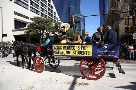 To kick of the Fort Worth Stock Show and Rodeo, organizers held an All-Western Parade on Sat., Jan. 17. Texas Wesleyan students participated in the parade through downtown Fort Worth.