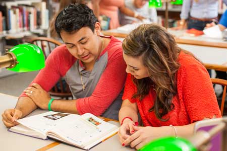 Texas Wesleyan students study in the library.