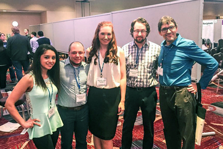Ashley Lopez, Phoenix Carlini, Alyssa Jones, Dr. Matt Hand and Dr. Jay Brown gather while presenting research at the annual Association for Psychological Sciences convention.
