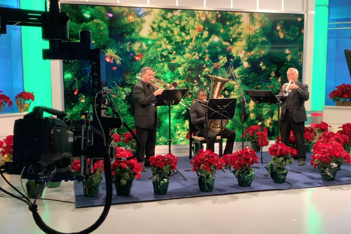 Photo of TXWES brass trio performing as part of CBS 11 Christmas morning special