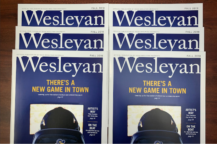 Photo of several copies of the fall 2018 issue of Wesleyan magazine.