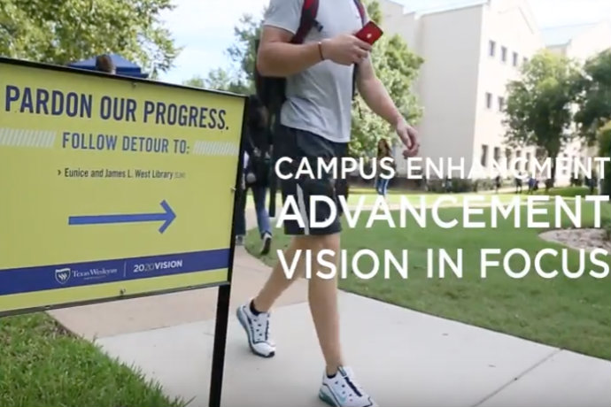 Image of Pardon our Progress sign on campus as part of Texas Wesleyan's 2020 Vision in Focus video on Advancement.