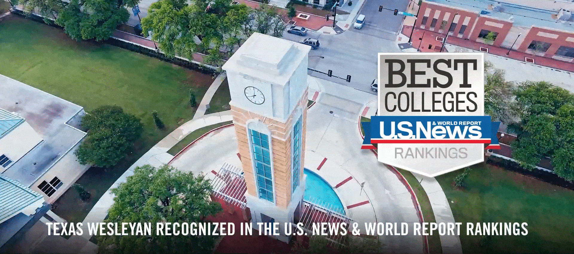 An aerial animated graphic image rotating around the University clock tower.