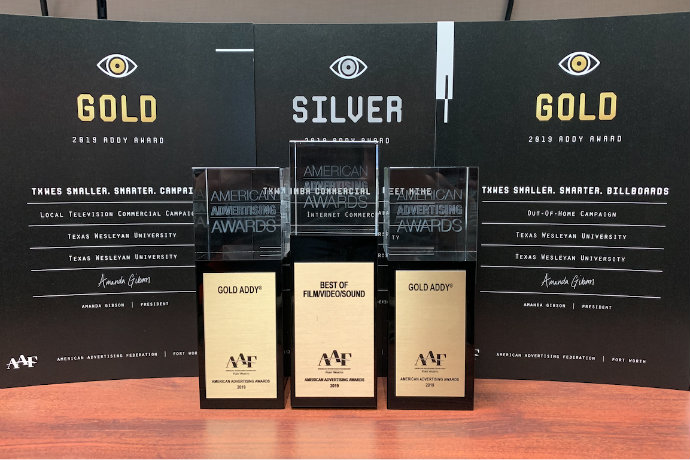 Photo of gold, silver and best in show awards that Texas Wesleyan received at the 2019 AAF Addy awards in Fort Worth.
