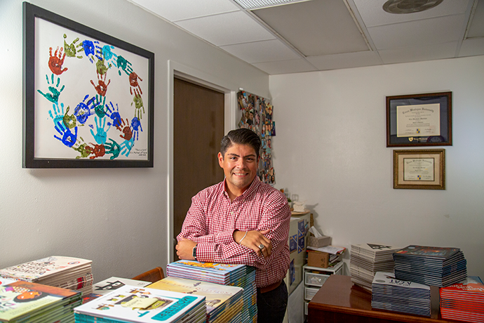 A photo of Eric Montoya in his office.