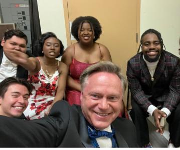 TXWES professor Keith Critcher taking a selfie with a group of students