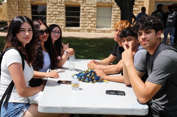 students sitting at table