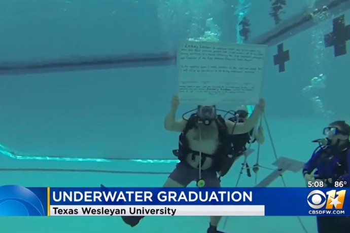 Photo of CBS 11's underwater graduation coverage