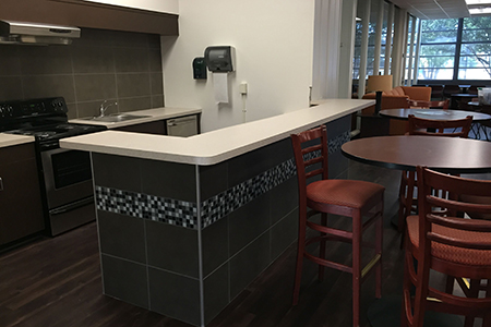 The kitchen in the Stella common area got a full redo with new appliances, cabinets, flooring and a stone front.