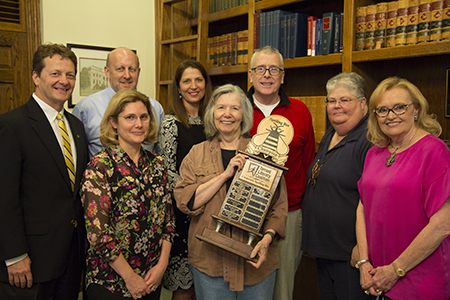 Representatives from the Tarrant Literacy Coalition, Kathryn B. Thompson, executive director, and Jane Nober, chairman of the board, were on campus May 13 to present the Corporate Spelling Bee traveling trophy to the Wesleyan Crushers.