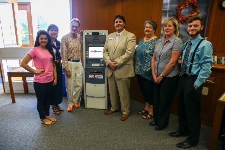 The West Library is now home to an OmniAmerican Bank ATM machine. 