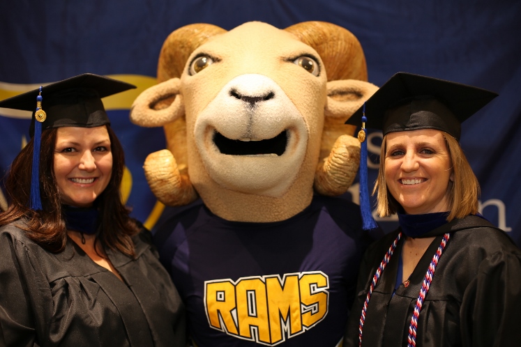 Commencement Photo of students with mascot